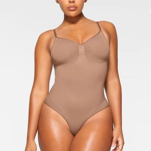 SKIMS body suit